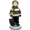 Deko - Figur Junge mit Schlittschuhen im Schnee